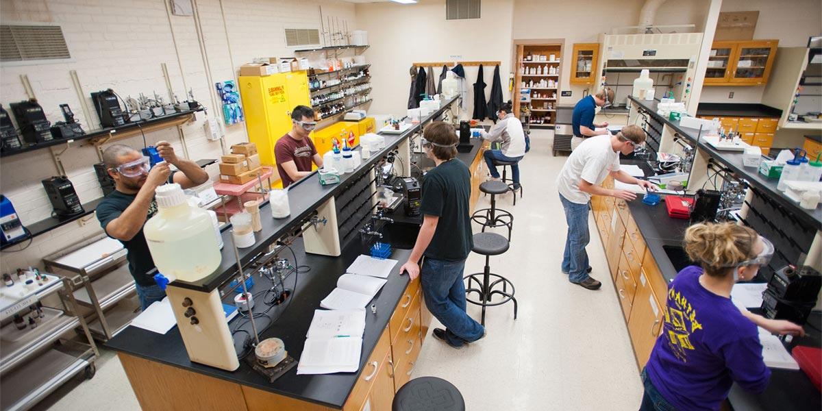 Students conduct experiments in a science lab